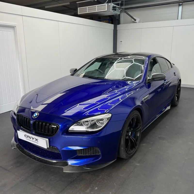 Blue BMW M6 Gran Coupé F06 with fitted carbon fibre side skirts