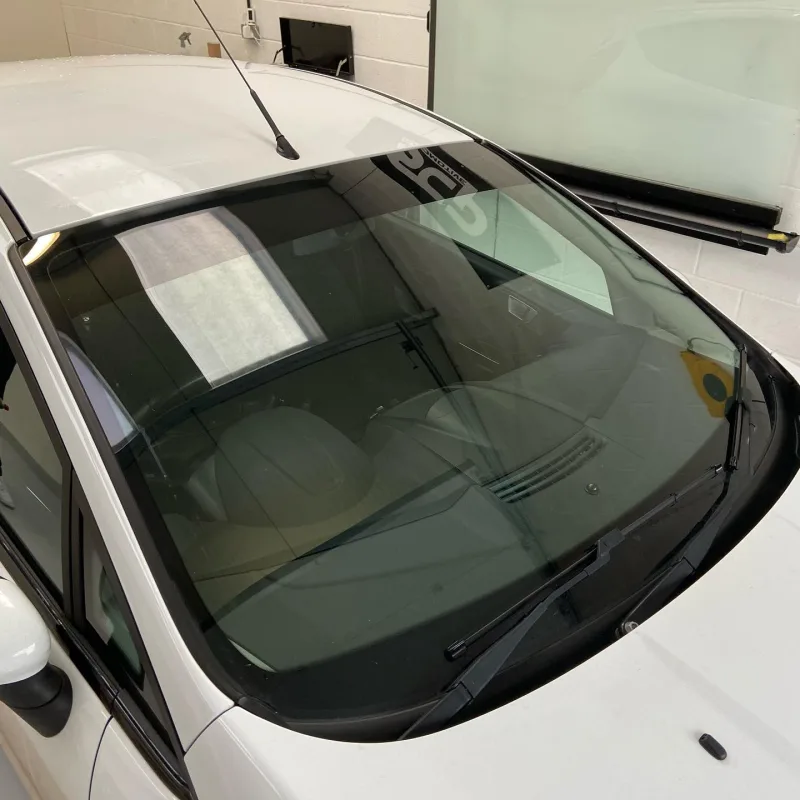 White Ford Fiesta LLumar 5% Sunstrip