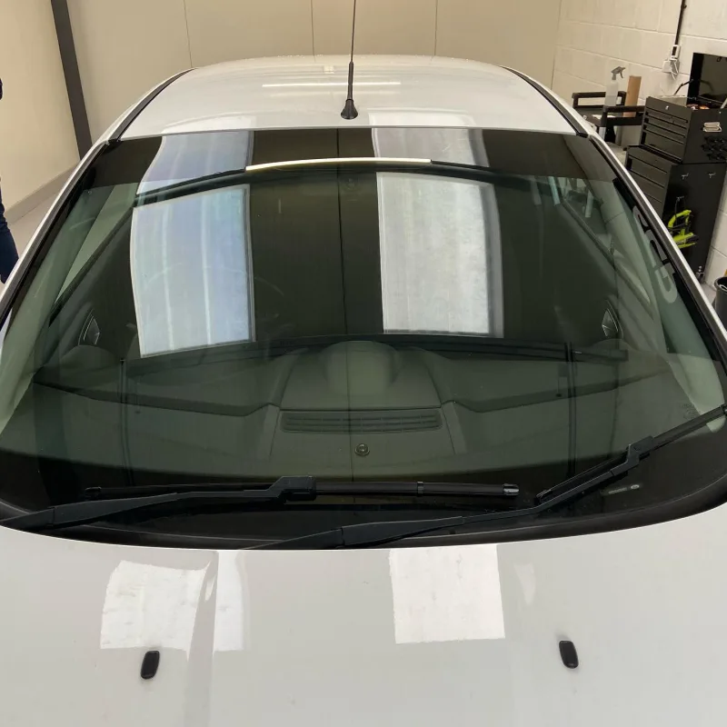 White Ford Fiesta LLumar 5% Sunstrip
