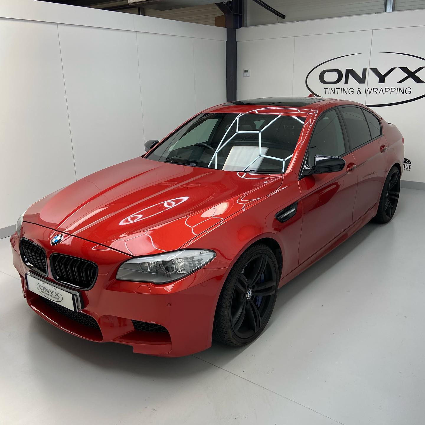 BMW M5 F10 Sakhir Orange and Gloss Black Details